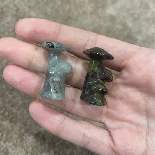 Triple mushroom carvings